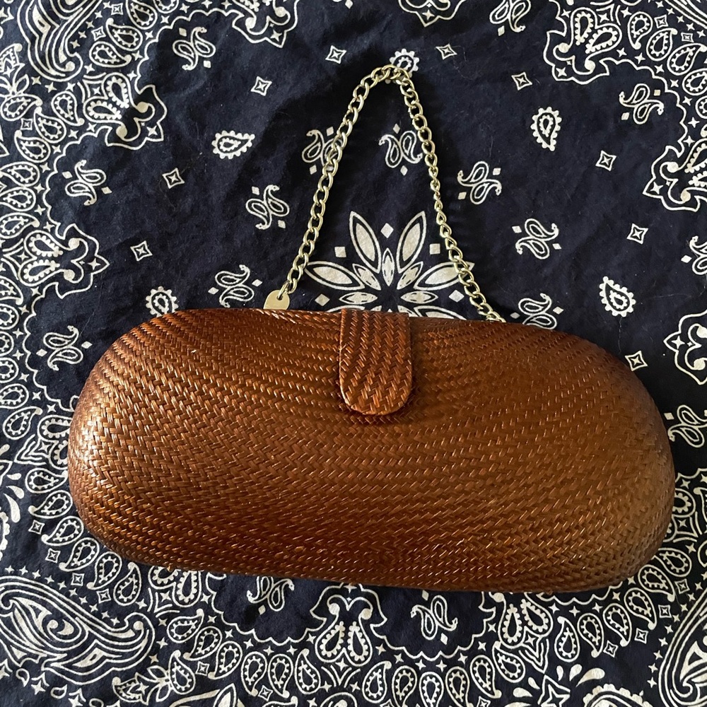 Vintage The SAK woven clutch